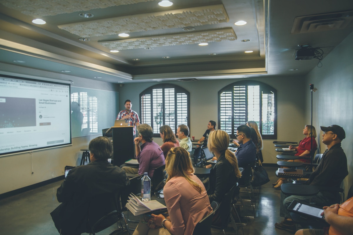 Education professionals collaborating on teacher recruitment